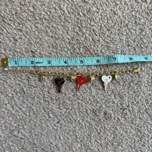 Upcycled Chanel Gold Charm Bracelet with Black, Red, and White Heart Key Charms
